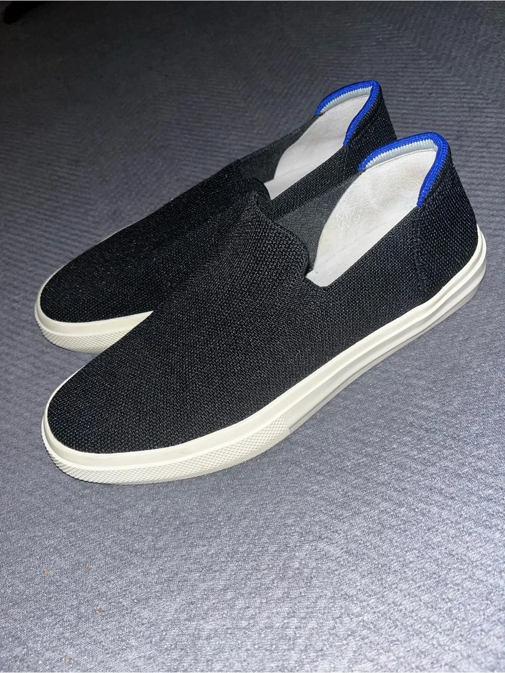 EUC Rothy's The Original Slip-On Sneakers in black. Size 9